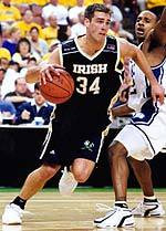 David Graves drives past Duke's Jason Williams in the team's 2002 NCAA Tournament matchup.