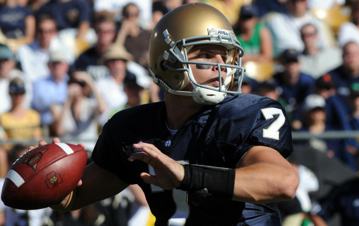 Jimmy Clausen throws a pass during first-quarter action. (AP Photo/Joe Raymond)