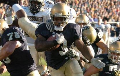 Darius Walker heads to the end zone for a touchdown.
