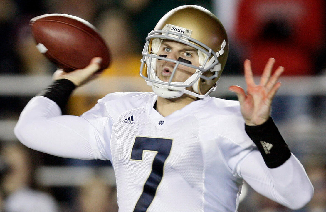 Jimmy Clausen passes during the first quarter. (AP Photo)