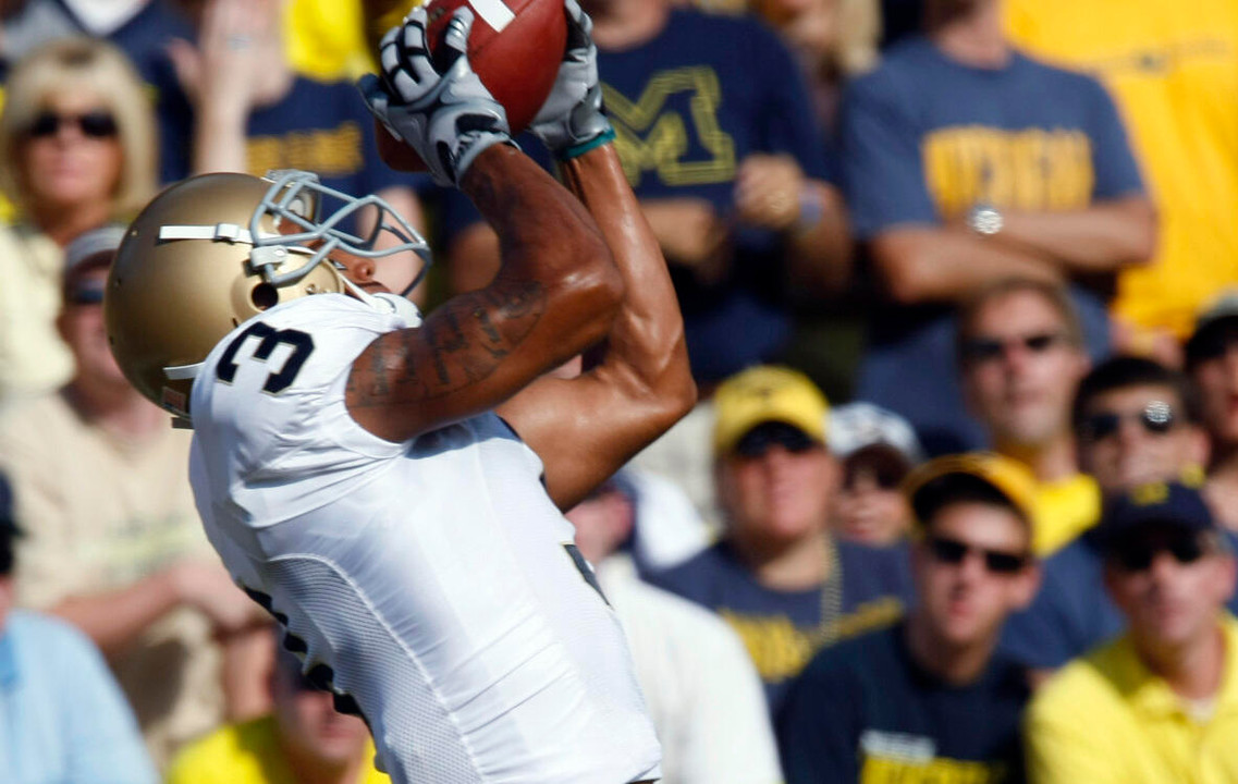 Michael Floyd catches a touchdown pass in the second quarter.