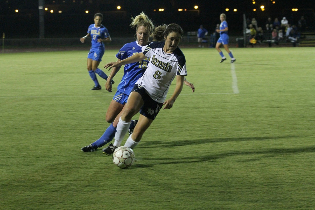 Freshman midfielder Elizabeth Tucker netted a pair of timely second-half goals to lift Notre Dame to a 2-0 win at No. 6 Oklahoma State in an NCAA Championship quarterfinal match on Friday night in Stillwater, Okla.