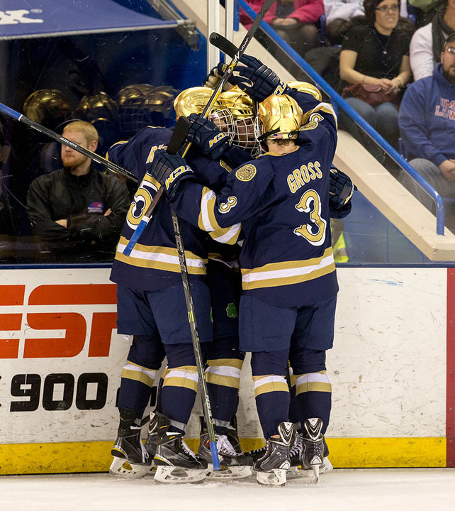 The Irish celebrate Sam Herr's goal in the second period.