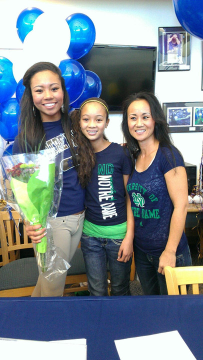 Simmone Collins (left) signed her NLI to attend Notre Dame next year Wednesday.