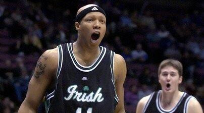 Notre Dame's Rick Cornett (11) and Rob Kurz celebrate during second half NCAA basketball against Seton Hall Saturday night, Feb. 18, 2006 in East Rutherford, N.J. Notre Dame beat Seton Hall, 102-91. (AP Photo/Bill Kostroun)