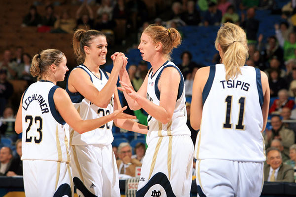 Freshman forward Becca Bruszewski (left) poured in a season-high 13 points on 6-of-9 shooting to help the Irish roll past Central Michigan, 94-41 on Tuesday night.