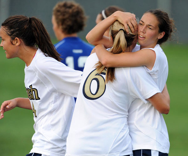 Senior forward Kerri Hanks gives a well-deserved hug to freshman forward Melissa Henderson after the rookie set up the veteran on Notre Dame's first goal in a 3-1 exhibition win over Memphis on Tuesday night at Alumni Field.