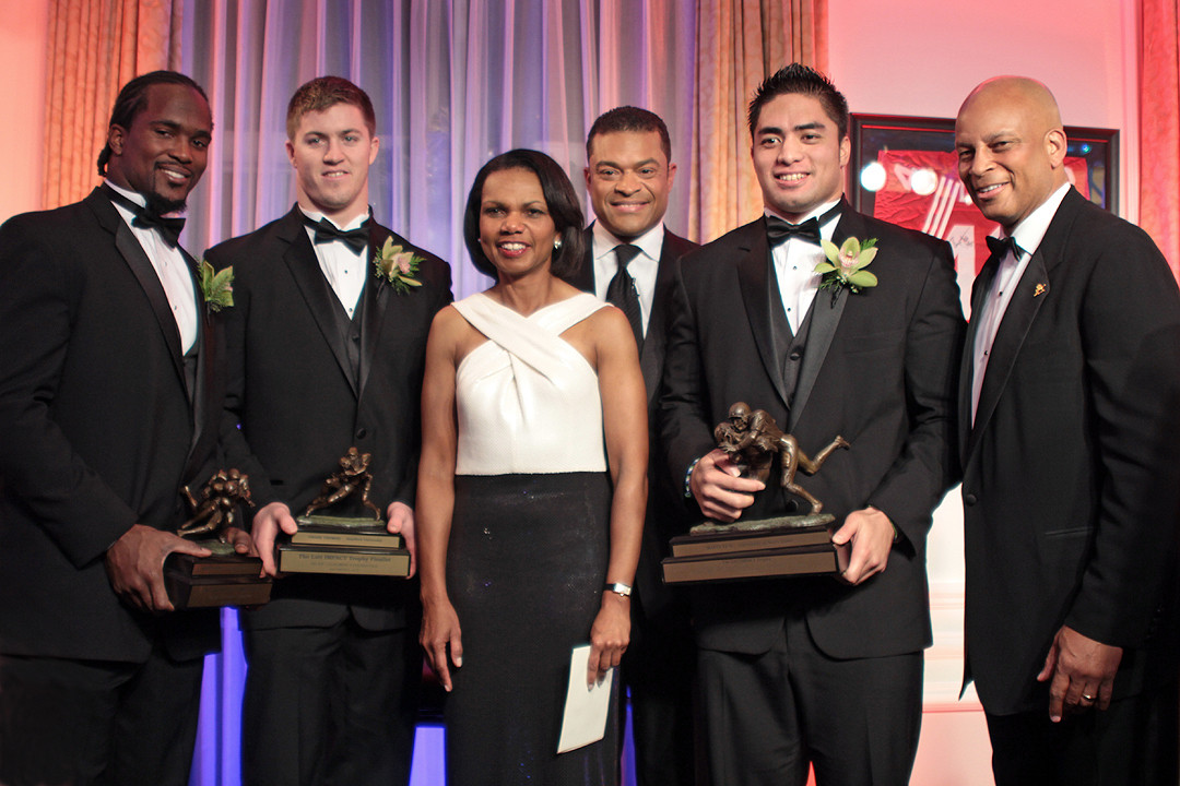 Manti Te'o with the Lott IMPACT Trophy and Hall of Fame namesake Ronnie Lott