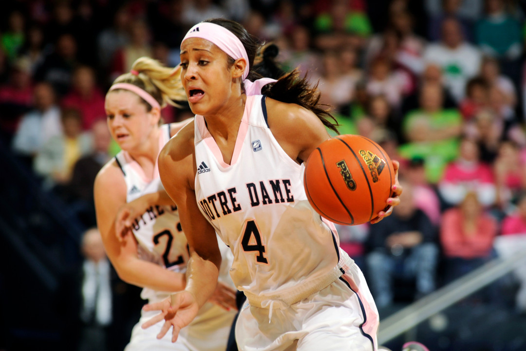Notre Dame guard Skylar Diggins (4) dribbles upcourt against West Virginia.