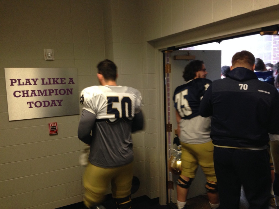 Chase Hounshell pauses before touching Father Ryan High School's