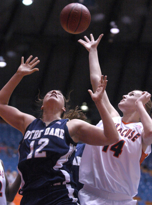 Syracuse's Vaida Sipaviciute battles Teresa Borton for a rebound during the first half.