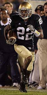 Ambrose Wooden was a two-way star for the Irish, starting at quarterback (for the first time since high school) and also playing in the Notre Dame secondary on defense.