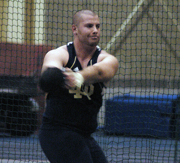 Sophomore Greg Davis won the weight throw at last year's Indoor Opener.