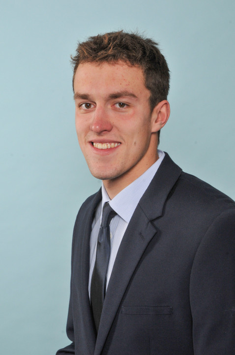 Matthew Grauslys took first in the 200 fly Friday night against Virginia.