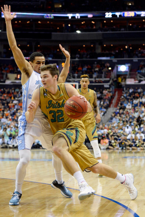 Steve Vasturia drives against UNC's Marcus Paige in the ACC Tournament.