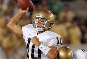 Brady Quinn throws a pass in the first half.  (AP Photo)