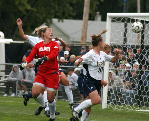 Brittany Bock snapped in a pair of headers while extending her career-best goal streak to five games in the 5-0 win over Louisville.