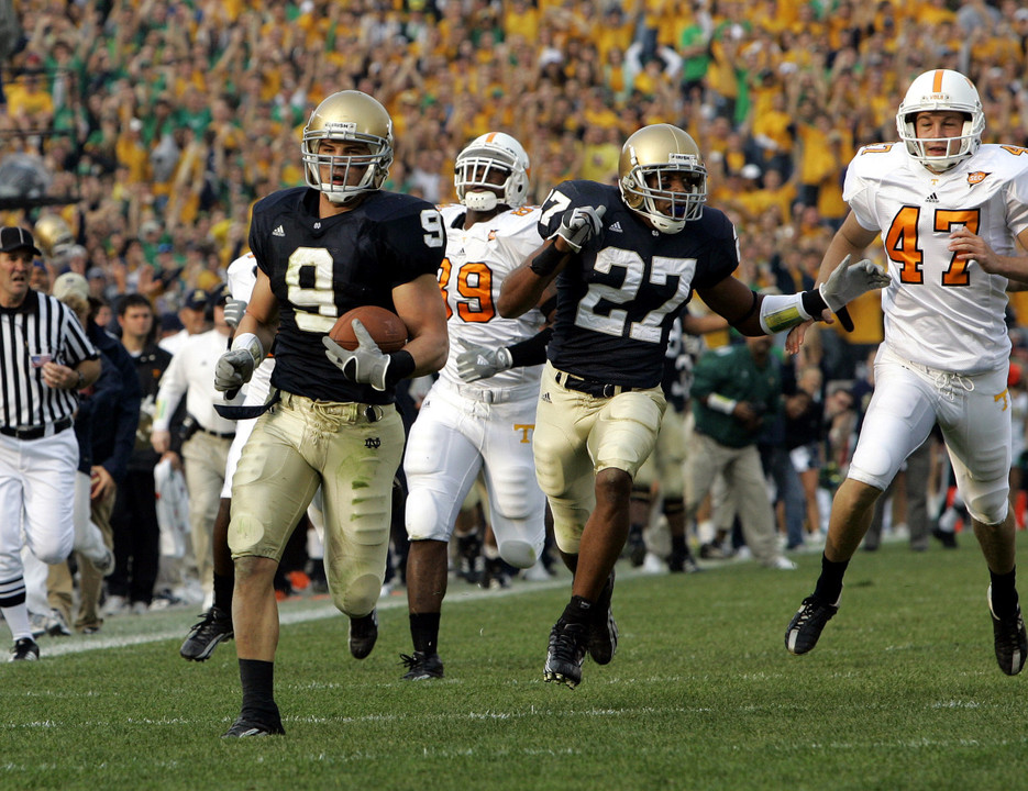 Tom Zbikowski scores his first touchdown of the game against Tennessee, a 78-yard punt return.