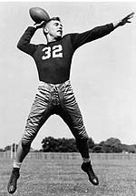John Lujack , the 1947 Heisman Trophy winner,  takes down Felix "Doc" Blanchard in the third quarter of the 1946 game against Army. Many have called Lujack's game saving tackle one of the greates