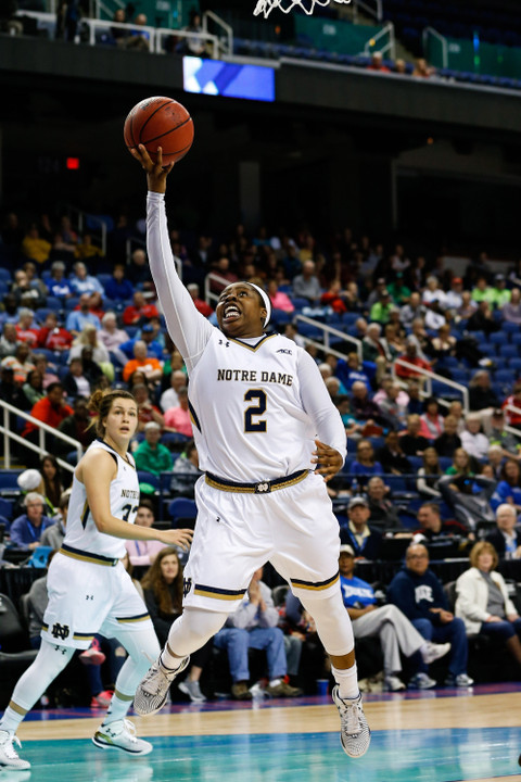 Arike Ogunbowale lays up a fast break shot against the Duke Blue Devils.