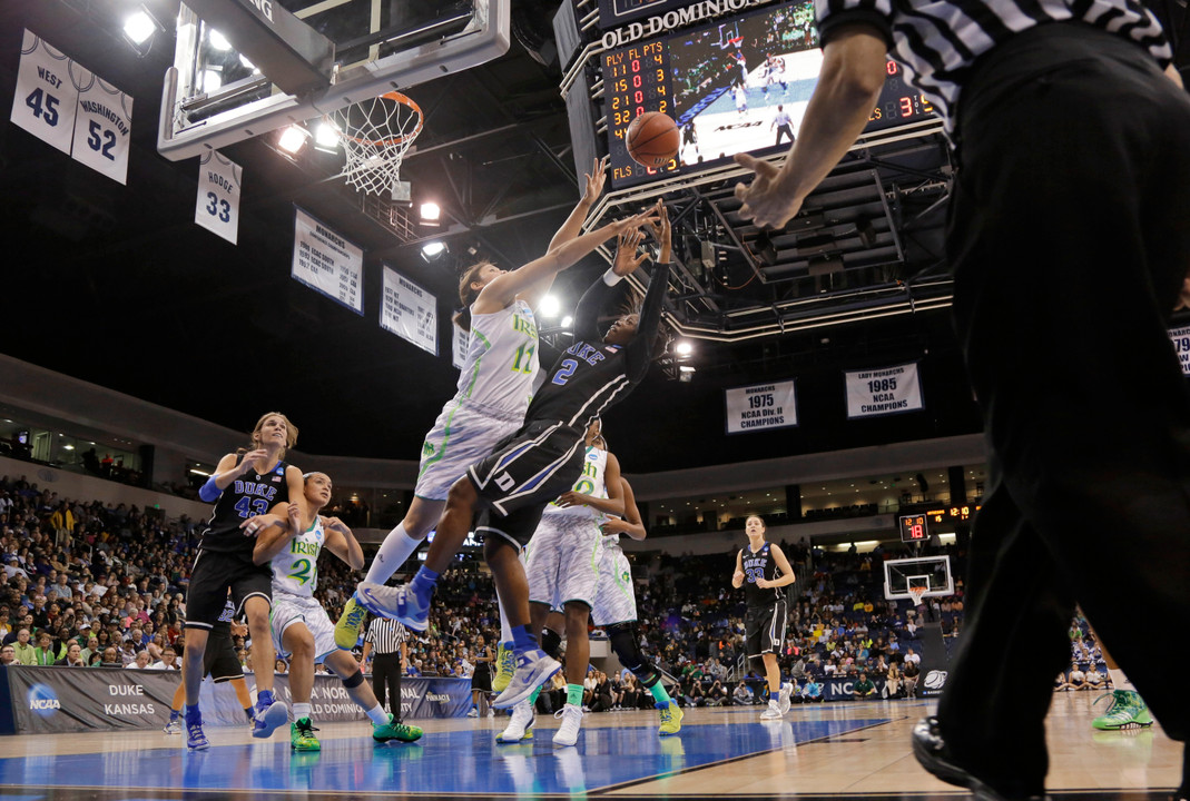 Natalie Achonwa blocks a shot in the regional final win over McCallie's Duke team.