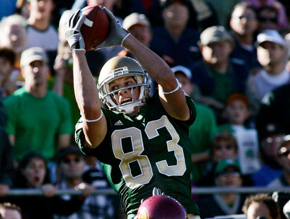 Jeff Samardzija goes up over Southern California's Justin Wyatt for a 32-yard touchdown in the second quarter. (AP Photo/Tom Strattman)