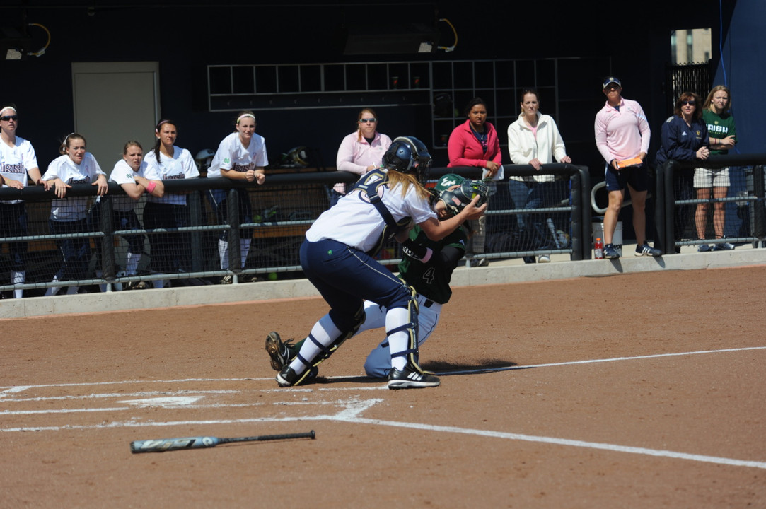 Kristina Wright caught a Raider runner stealing to end Saturday night's game at the NCAA Ann Arbor Regional.