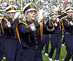The Notre Dame marching band enters Notre Dame Stadium.