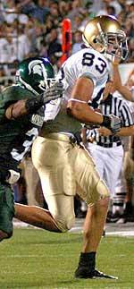 Junior Jeff Samardzija catches touchdown passes for the Irish in the fall and then grabs the glove and spikes of baseball in the spring when he pitches for the Notre Dame baseball team.  The hard-throwing righthander was 8-1 with a 3.89 ERA while throwing 78.2 innings during the 2004 campaign.