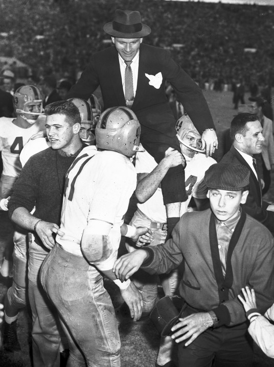 Notre Dame head coach Terry Brennan is carried off Owen Field by Jim Just (44) and other players following their 7-0 win over Oklahoma in an NCAA college football game in Norman, Okla. Notre Dame's Ron Toth (43) and Jim Colosimo (41) also celebrate the final. That victory ended the Sooners' NCAA-record winning streak at 47 games and came just a season after the Sooners beat the Irish 40-0 in South Bend, still the most lopsided home loss in Notre Dame history. (AP Photo/File)