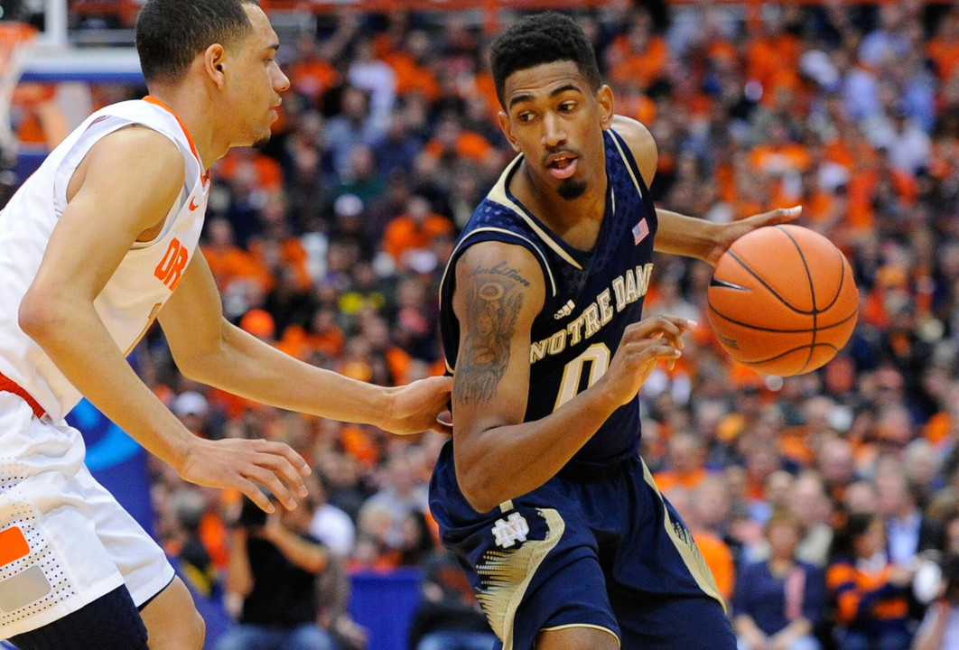 Notre Dame Fighting Irish guard Eric Atkins (0) controls the ball. (Rich Barnes-USA TODAY Sports)