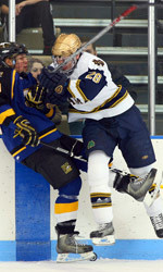Senior right wing Tim Wallace never missed a game in his Notre Dame career, playing in 153 consecutive games, a school record.