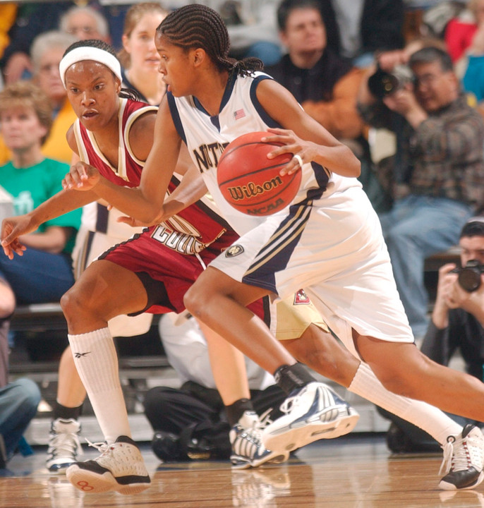 Charel Allen drives the lane against Boston College guard Aja Parham during first half action.