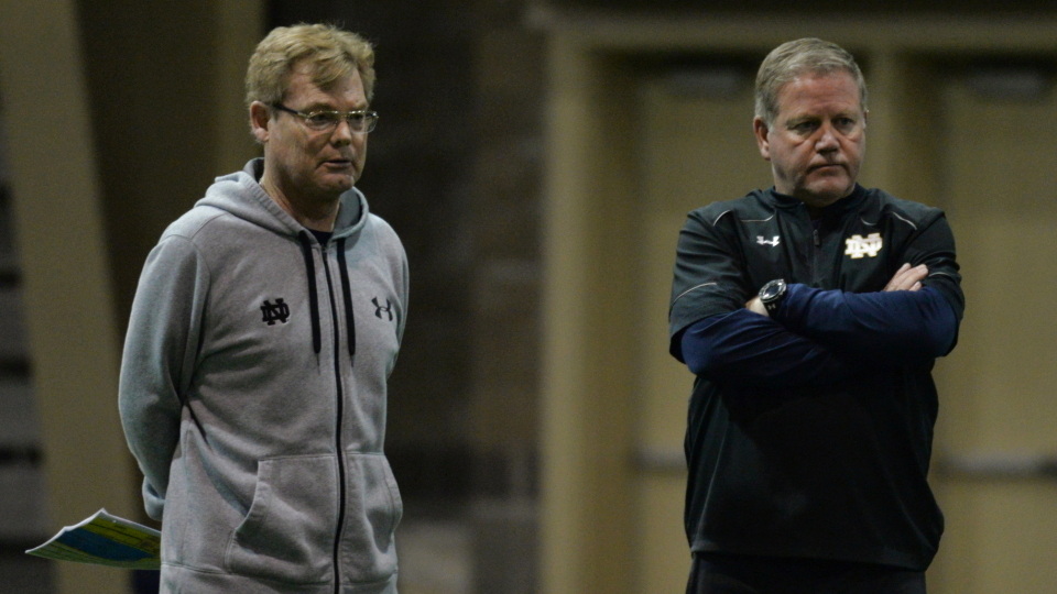 Bob Elliott (left) and Irish head coach Brian Kelly
